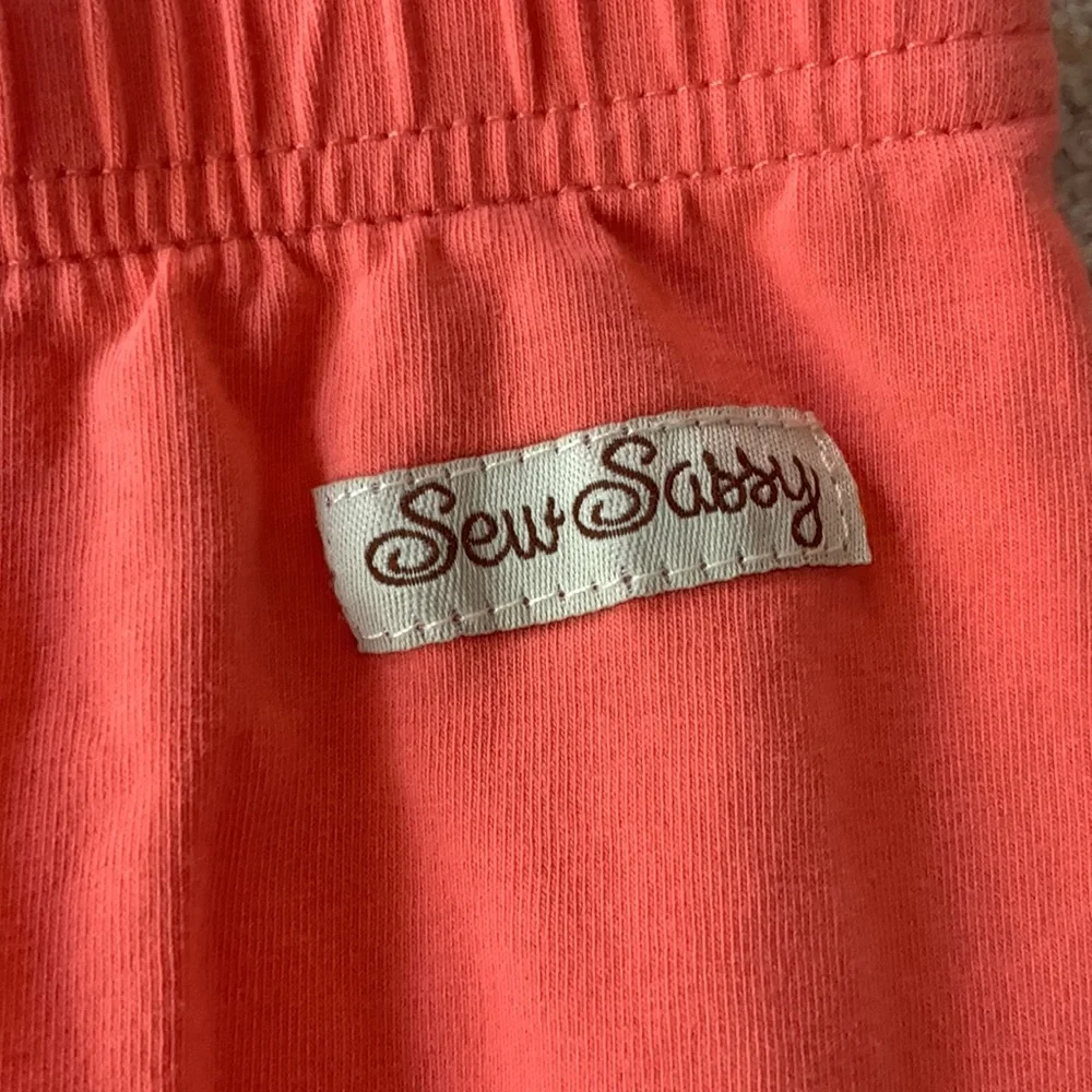 Sew Sassy Coral Ruffled Leggings